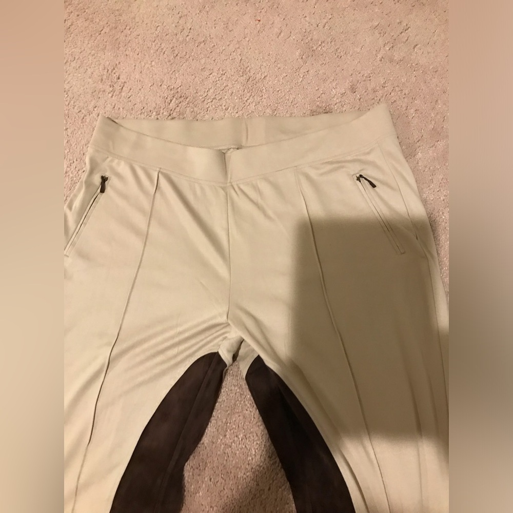 Cream knit pants with faux suede, front zip for faux pocket with faux suede pull